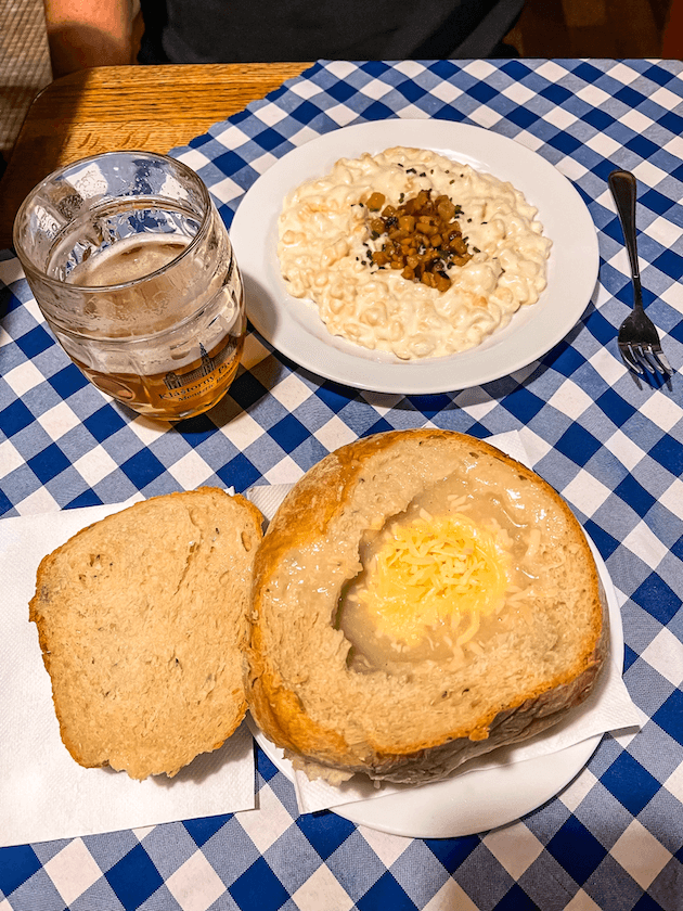 garlic soup, dumplings with sheep's cheese, and beer from Bratislava Flagship Restaurant