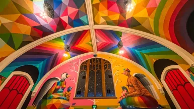 inside the international church of cannabis in denver with colorful walls and ceilings