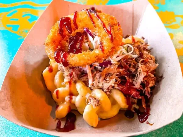 Barbecue Mac & Cheese with a fried onion ring on top at Flaming Barbecue in Disney World