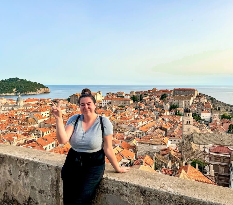 Elaina standing on the old city walls in Dubrovnik, Croatia