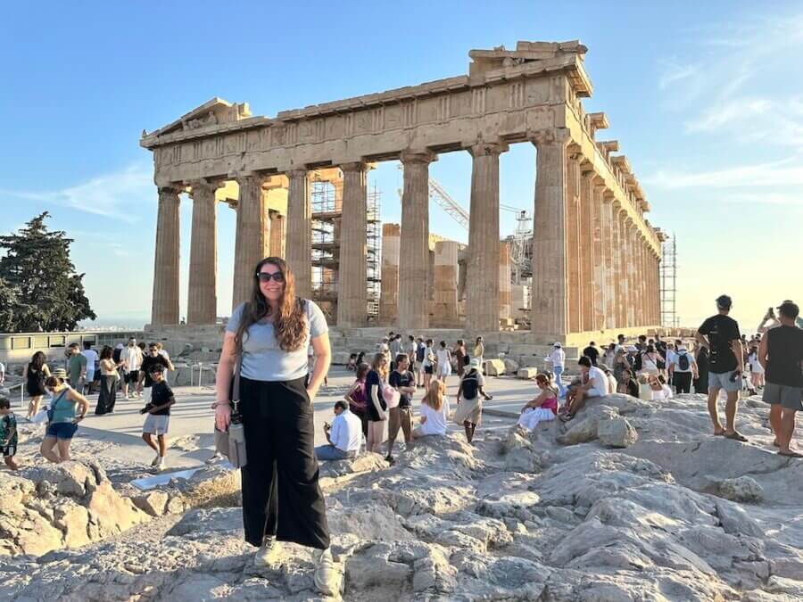 Elaina standing in front of the Parthenon in the Acropolis in Athens, Greece